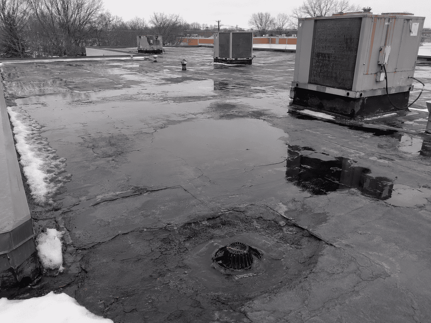 Flat roof water damage in Benton Harbor, MI