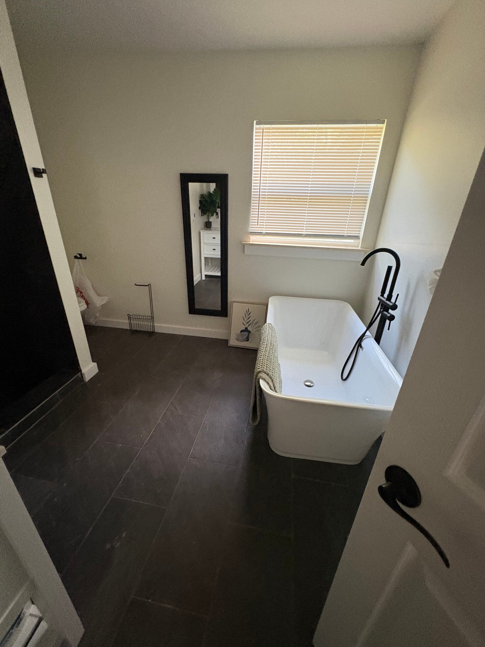 Bathroom remodel in progress with freestanding tub in Benton Harbor, MI