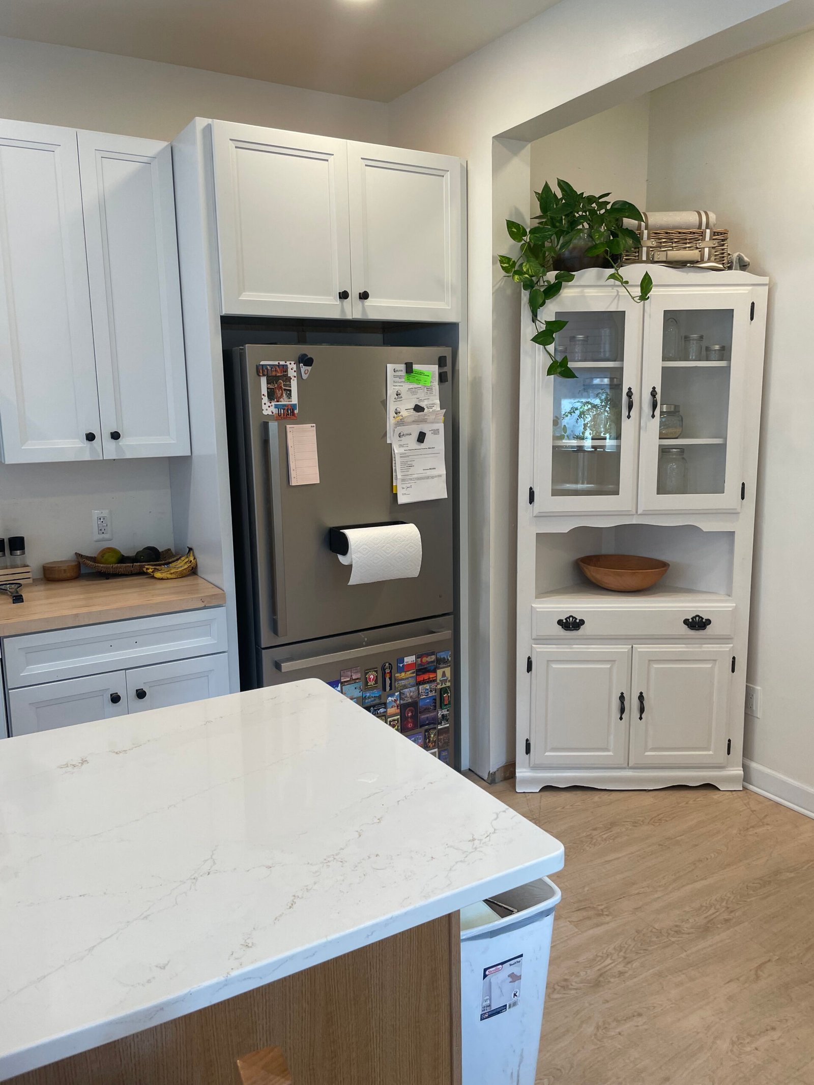 Kitchen remodel with white cabinetry and hutch in Benton Harbor, MI