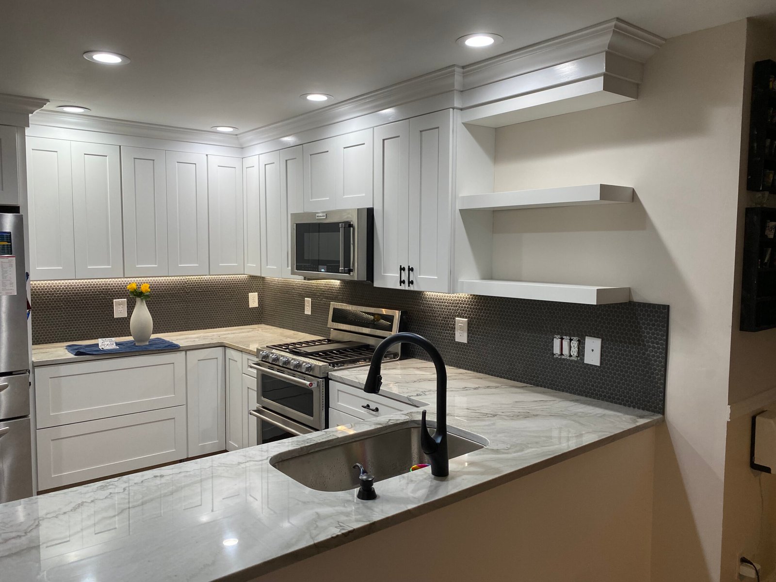 Kitchen remodel with stainless range and tile backsplash in Benton Harbor, MI