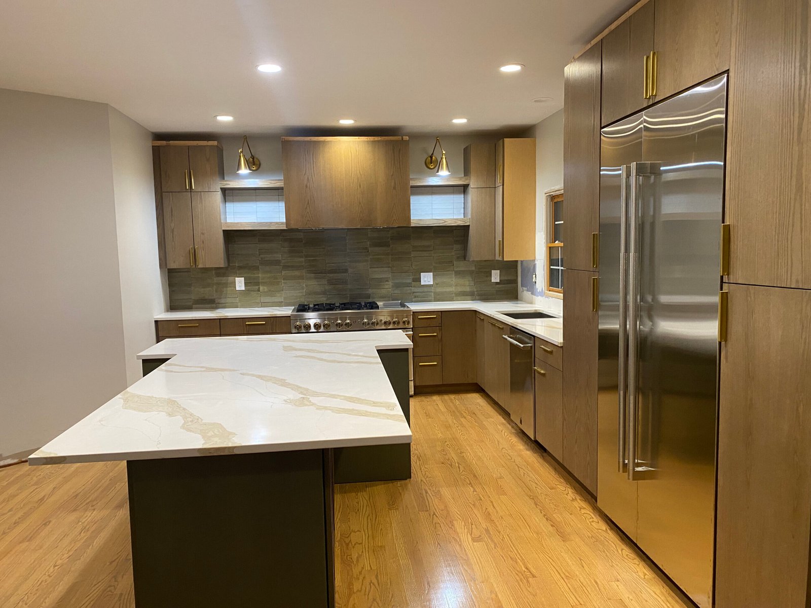 Kitchen remodel with marble waterfall island in Benton Harbor, MI