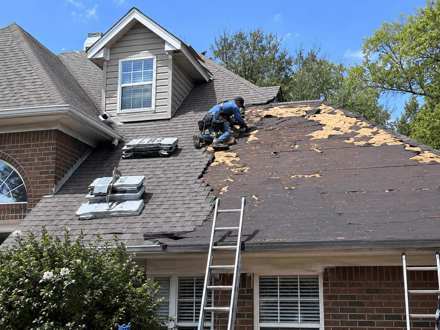Roof repair in progress on a Benton Harbor, MI home